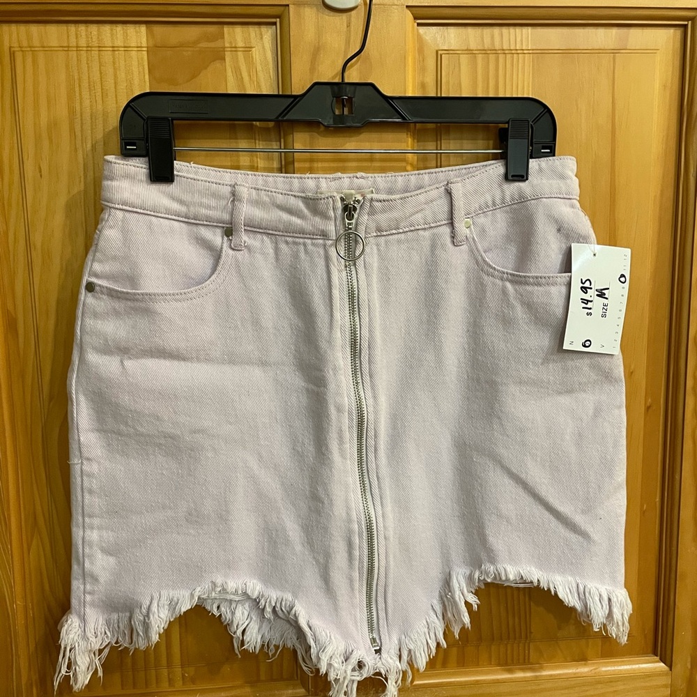 Light lavender colored zip up jean skirt